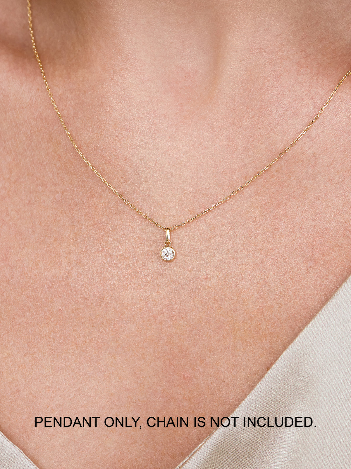 Round Bezel Lab Grown Diamond Pendant in 14K Gold